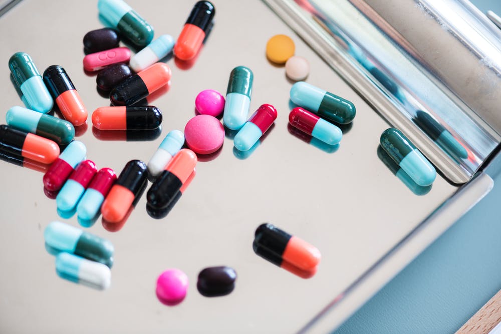 colorful pills on tray