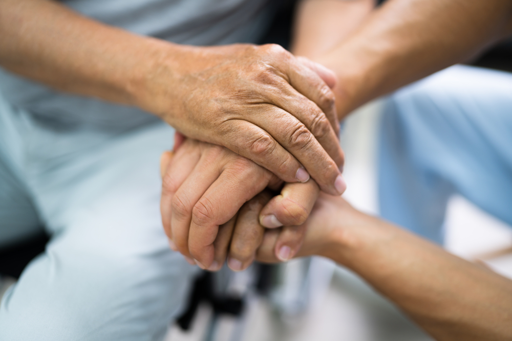 Common Forms Of Elder Abuse - Elder Patient Helping Nurse Hand