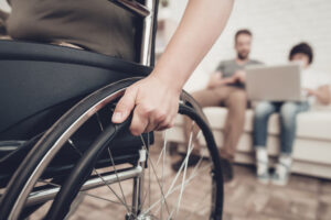 Dealing With Catastrophic Injuries - Disabled Soldier In A Wheelchair. Paralyzed Woman.