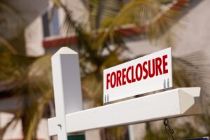 Foreclosure sign on the outside of a house